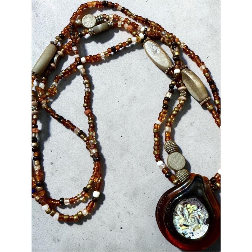 Brown Art Glass Swirly Pendant on a brown tones Glass Beaded Necklace 26”